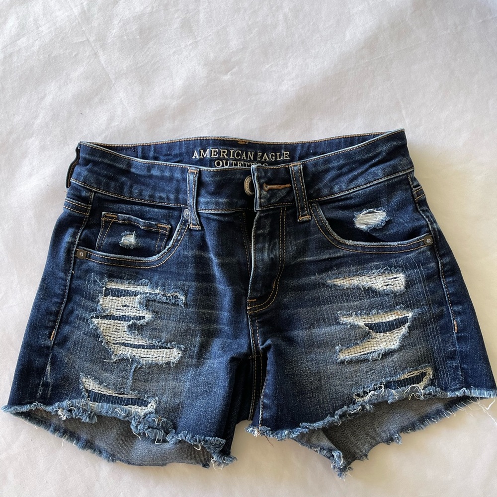 Distressed jean cut off shorts by American Eagle